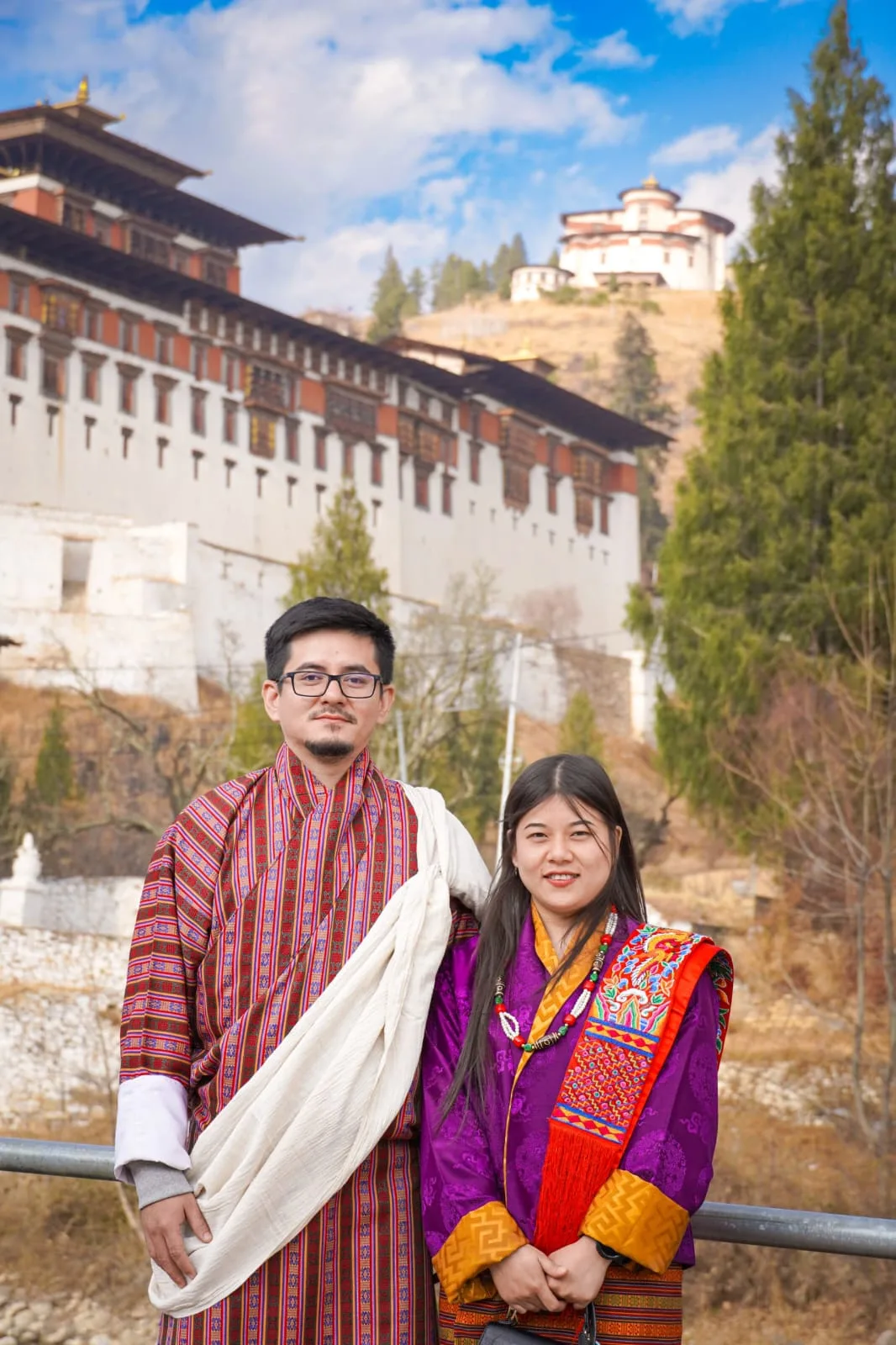 A couple in traditional Bhutanese kira on their Trishika Tours trip
